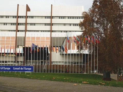 Workers put all flags at half-mast at Council of Europe Stock Footage 80618152