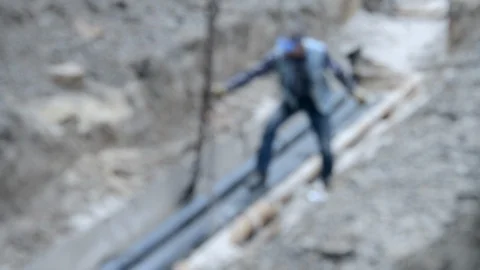 Workers put pipes with a construction crane Stock Footage 101233716