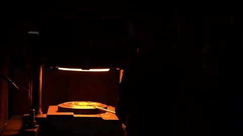 Workers put the workpiece on a Metal press to stretch the hot metal  Video stock 143320559