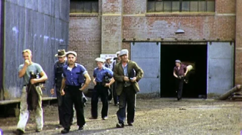 Workers Quitting Time Men Leaving Factory 1940s Vintage Film Movie Footage 1735 Stock Footage