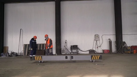 Workers raise discuss the task. 4K Stock Footage 104656840