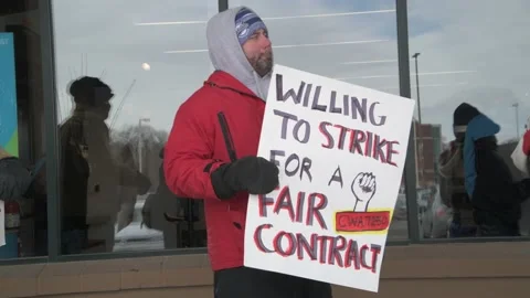 Workers rally against AT&amp;T mobility for better benefits and pay Video stock 170467647