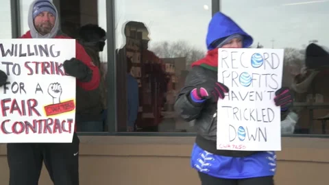 Workers rally against AT&amp;T mobility for better benefits and pay Video stock 170469316