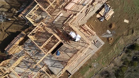 Workers reading blueprint on a construction site Stock-Footage 228794794