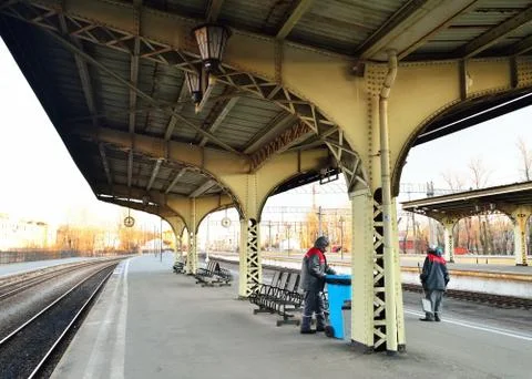 Workers refuel an empty garbage bag into the tank on the platfor Stock Photos