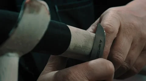 Workers remove the cable insulation with a knife 스톡 동영상 47348474