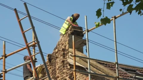 Workers remove chimney Stock Footage 281689166