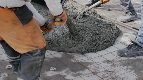 Workers remove shovels old cut asphalt from the road for laying new asphalt Stock Footage 152059418