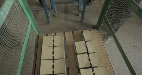 Workers Removing Battery Separators from Industrial Conveyor Belt (4K) Stock Footage 60787423