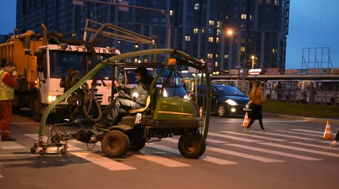 Workers renovating the road marking Stock Footage 54331643