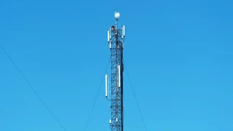 Workers repair cell tower. Laying new cables. High-altitude works Stock Footage 315217700
