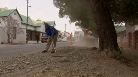Workers repair road 2 Stock Footage 59913843