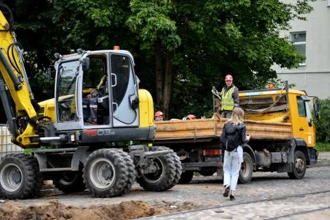 Workers repairing streets. Stock Photos