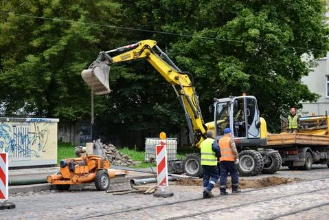 Workers repairing streets. Stock Photos