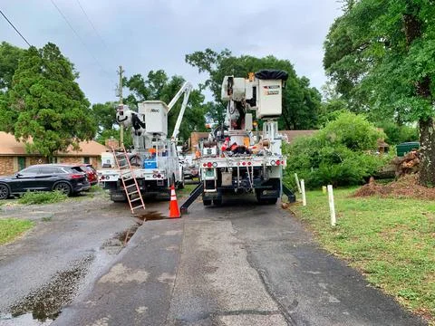 Workers replacing a power pole Stock Photos
