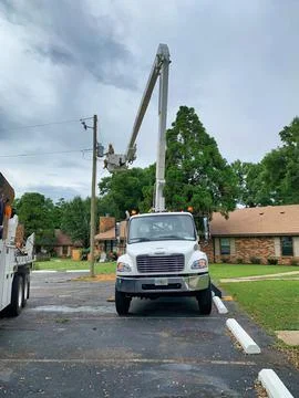 Workers replacing a power pole Stock Photos