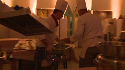 Workers in a restaurant kitchen Stock Footage 64130261