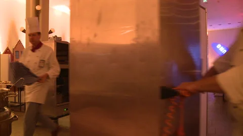 Workers in a restaurant kitchen Stock Footage 64130405