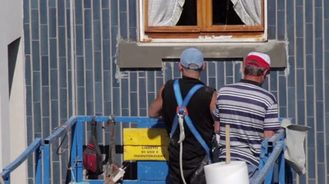 Workers restoring building use elevator Stock Footage 49451021