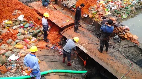 Workers in the river embankment construction. Stock Footage 71422113