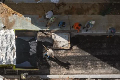 Workers on a road construction Stock Photos
