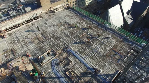 Workers on the roof of a building Stock Footage 64144435