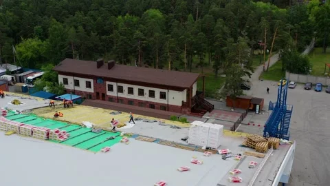 Workers on the roof stack heater Stock Footage 133025742