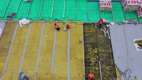 Workers on the roof stack heater Stock Footage 133026212