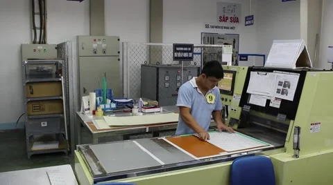 Workers running printers Stock Footage 56085641