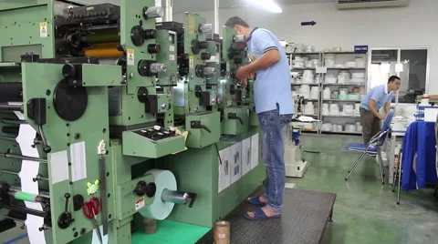 Workers running printers Stock Footage 56085653