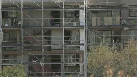 Workers on saffolding Stock Footage 77049284