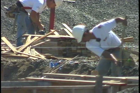 WORKERS SAW AND SHOVEL Stock Footage 1049641
