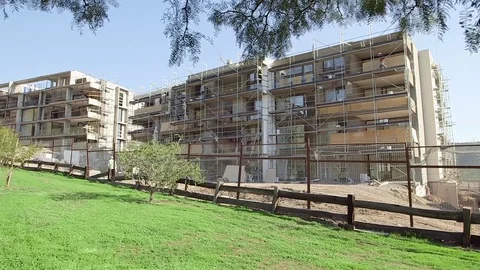 Workers on scaffolding Stock Footage 77049302