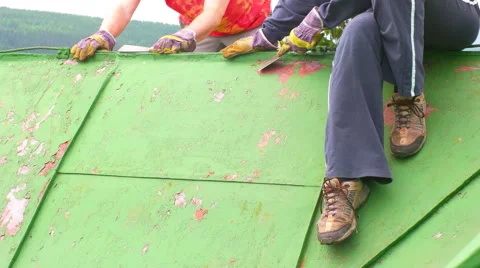 Workers Scraping off Layers of Paint Stock Footage 64079974