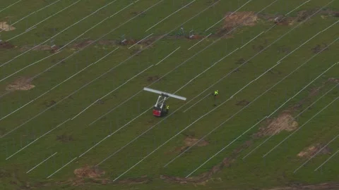 Workers seen from above assembling solar power system in Germany Stock Footage 320246668