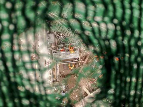 Workers seen from above at a construction site Stock Photos
