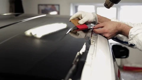 Workers at the service station is further processed edge vinyl special dryer. Stock Footage