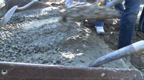 Workers shoveling concrete Stock Footage 57672652