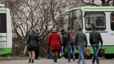 Workers sit in the crew bus Stock Footage 72714804