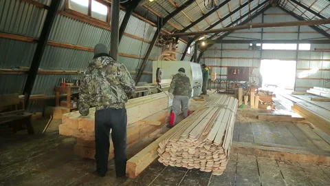 Workers sort the finished bar with the hoist Stock Footage 87195932