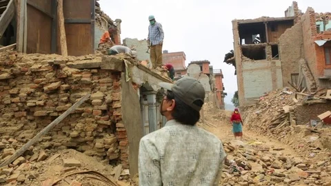 Workers sorting the materials from the wrecked site Stock Footage 77443850
