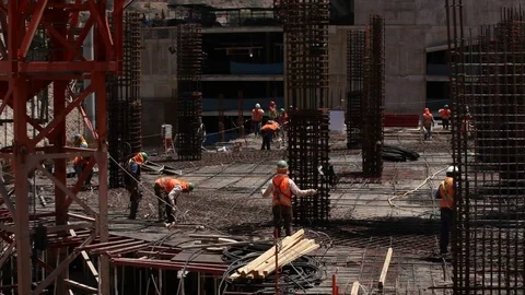 Workers on steel mesh Stock Footage 77100460