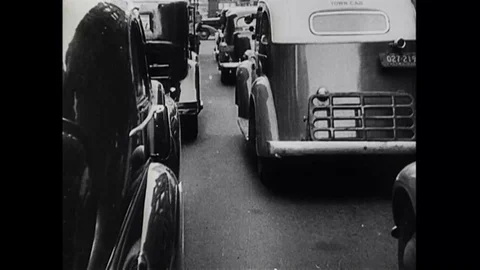 Workers store vehicles, convoy of trucks and factory establishment - 1943 Stock Footage 95198260