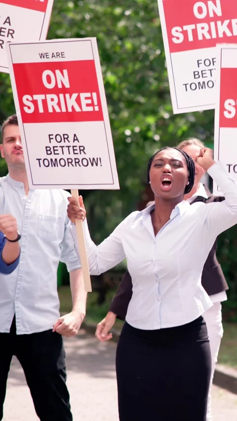 Workers Strike Demonstration In City. Labor Union March Stock Footage 246840458