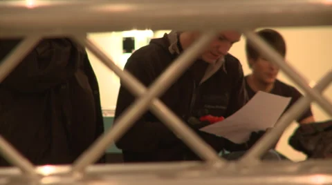 Workers studying a map Stock Footage 64116282