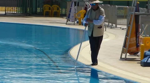 Workers swimming pool cleaning Video stock 65179689