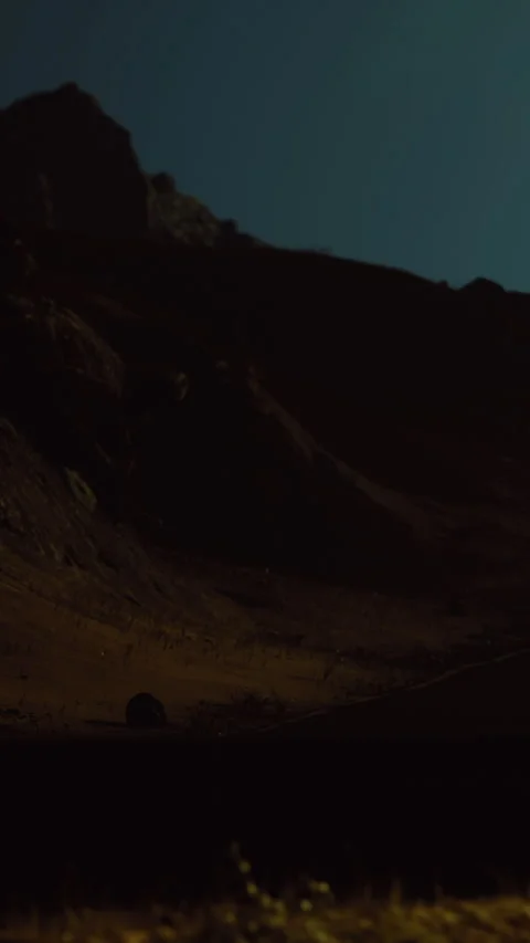 Workers take a break from mining activity in a remote area at night Stock Footage 334249051