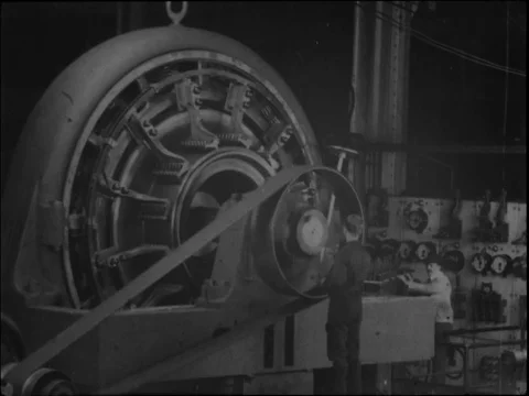 Workers testing a rotary converter in Westinghouse works - 1904 Stock Footage 91013976
