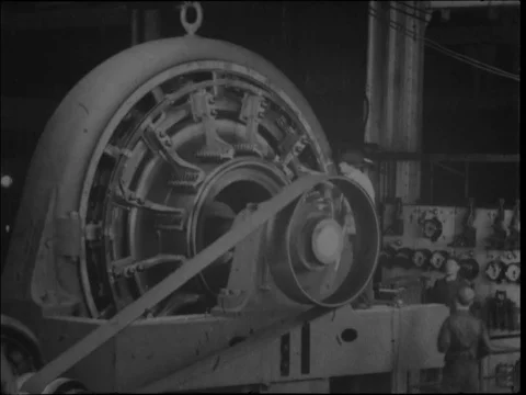 Workers testing a rotary converter in Westinghouse works - 1904 Stock Footage 91013980