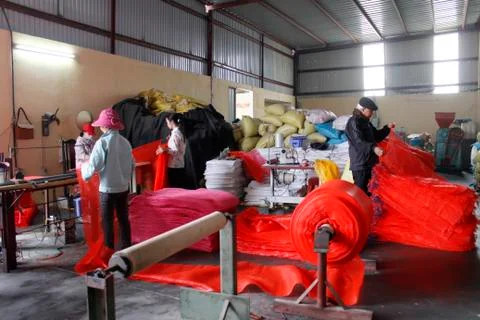 Workers in textile mill Stock Photos
